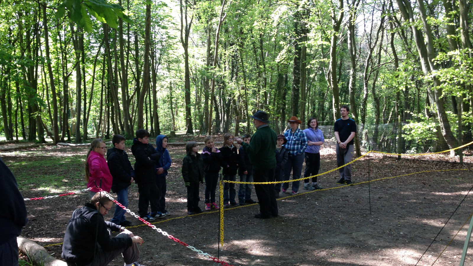 young people learning about archery